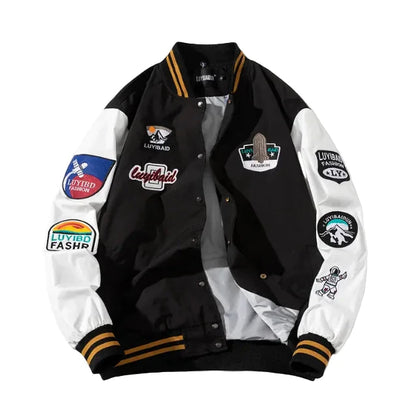 Black and white varsity jacket with multiple patches 