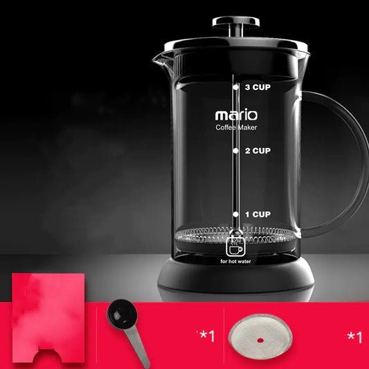 Glass coffee maker with measurement markings on a dark background