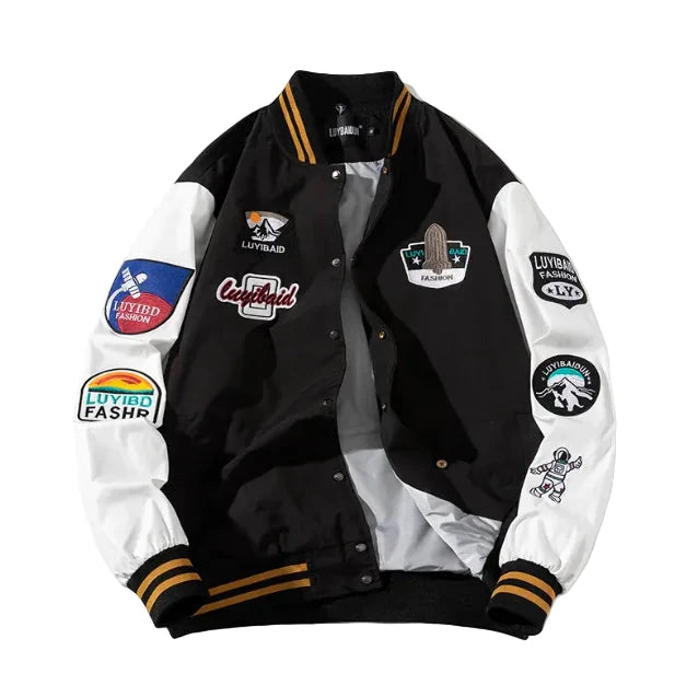 Black and white varsity jacket with multiple patches 